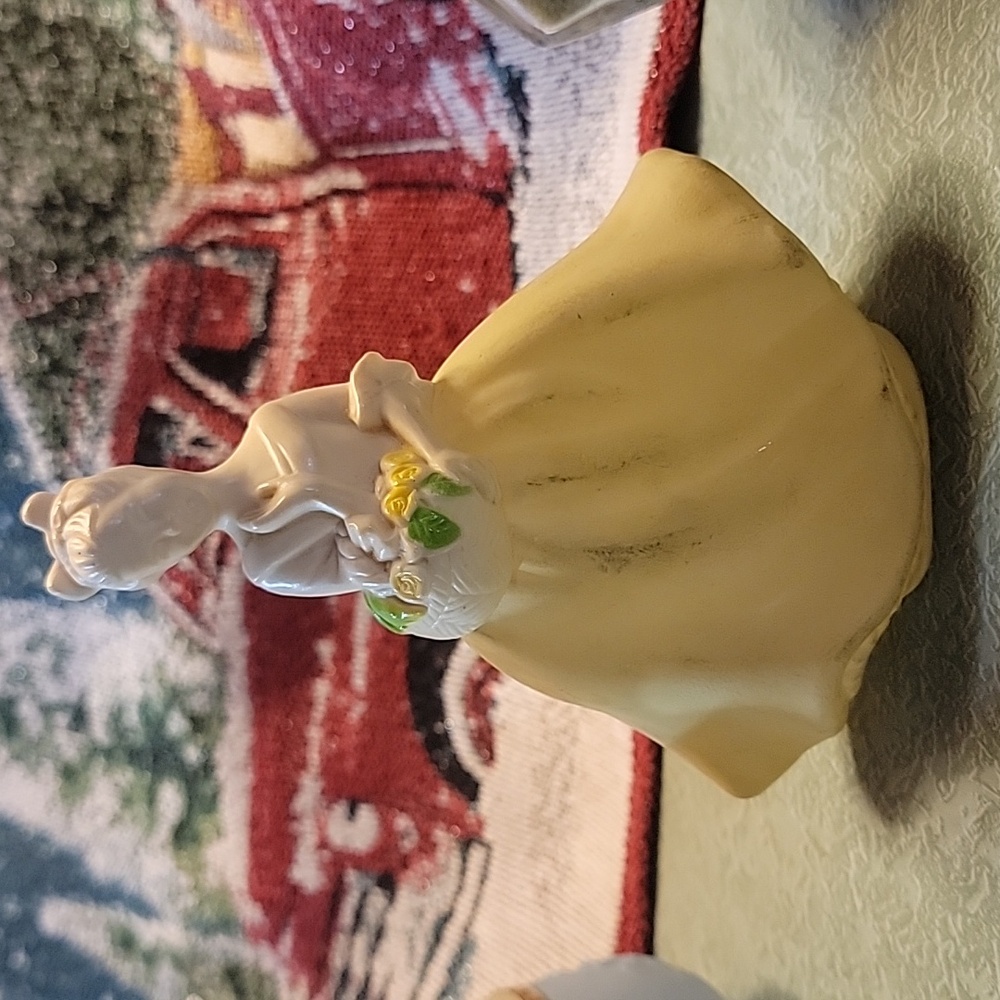 Avon lady figurine